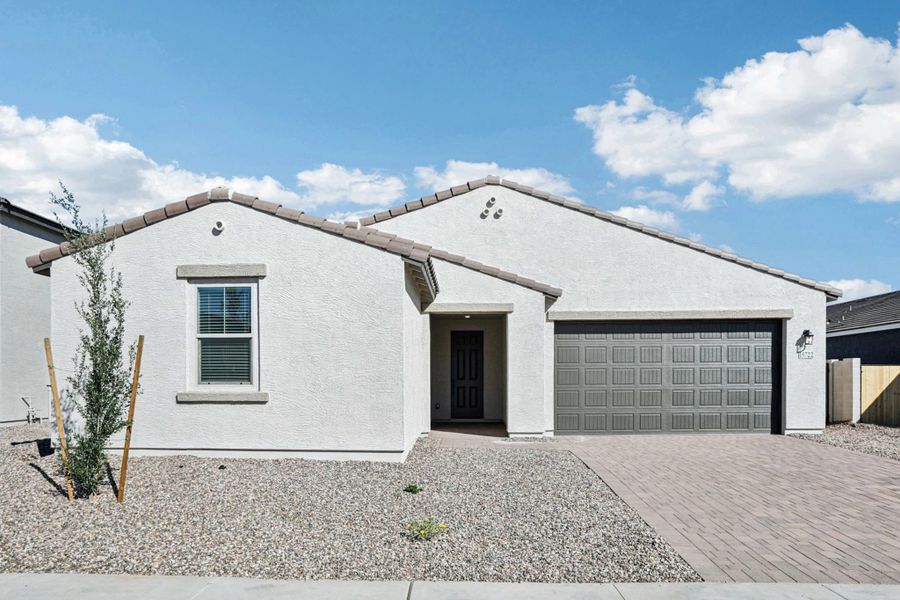 Representative exterior photo of a completed home built from the Jade by Ashton Woods in Marquis at Madera, Queen Creek, AZ (Image 18). Representative exterior photo of a completed home built from the Jade by Ashton Woods in Marquis at Madera, Queen Creek, AZ (Image 18).