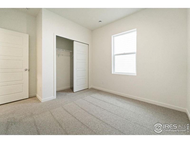 Spacious, unfurnished interior of a new home in Liberty Draw, Evans (Image 15).