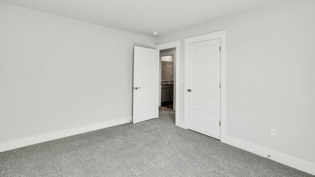 Spacious, unfurnished interior of a new home in Sidbury Station, Castle Hayne (Image 36).