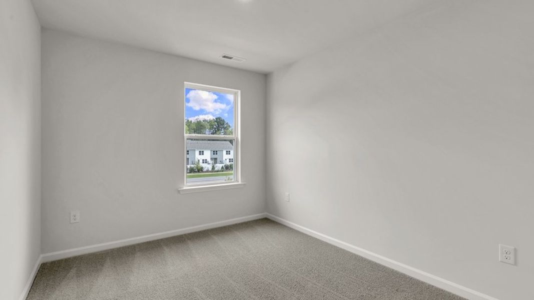 Spacious, unfurnished interior of a new home in The Townes at Wilson's Ridge, Smithfield (Image 27).