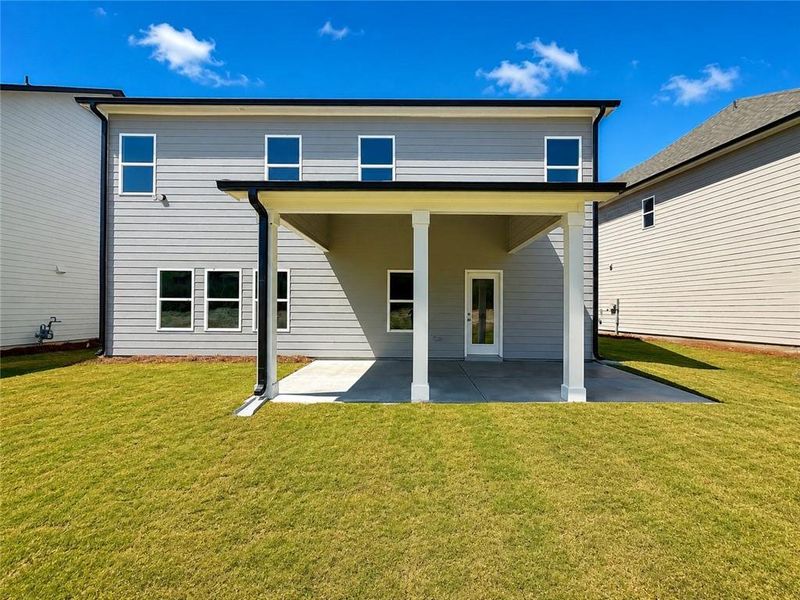 Exterior details and patio area of a home in Ponderosa Farms Estates, Gainesville (Image 4).