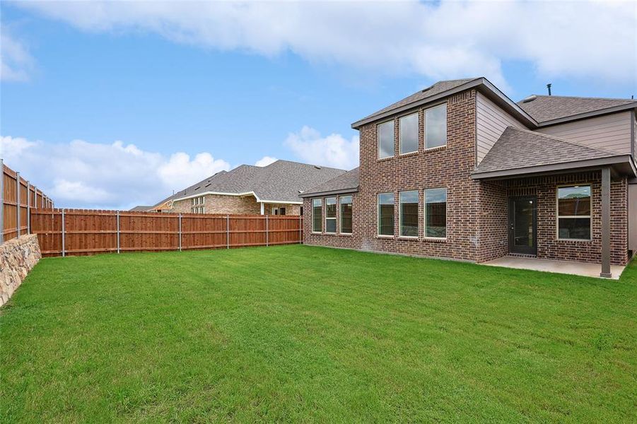 View of yard with a patio