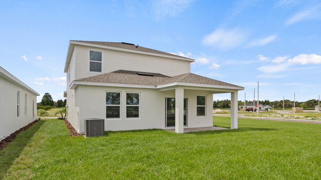 The Naples Back Exterior Quick Move-In Home at Willowbrook North by DRB Homes in Winter Haven, FL The Naples Back Exterior Quick Move-In Home at Willowbrook North by DRB Homes in Winter Haven, FL
