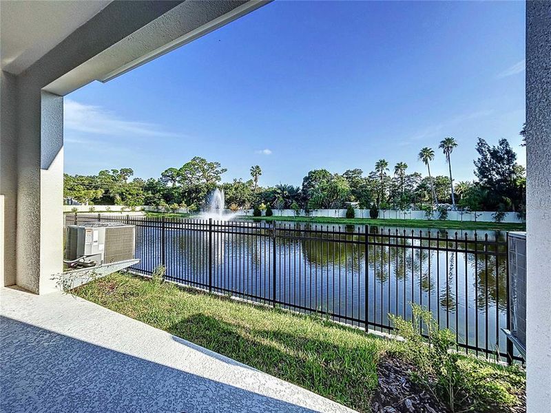 covered lanai with pond view