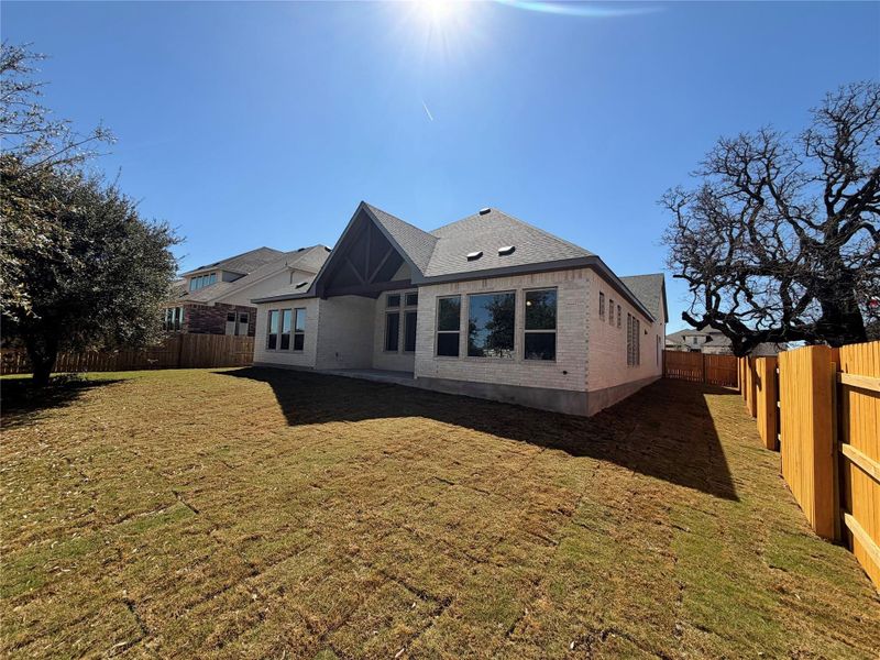 Exterior details and patio area of a home in Oaks at San Gabriel, Georgetown (Image 3).