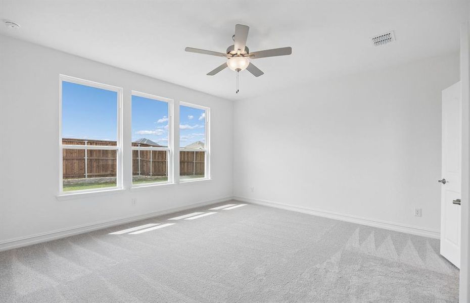 Primary suite with large widows
