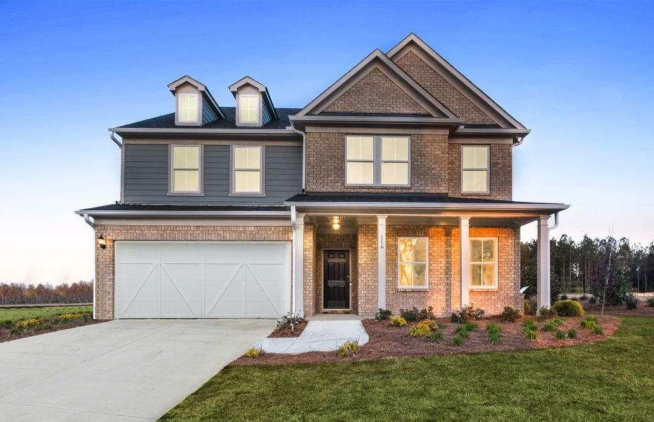 Front exterior of a new home in Hawthorne Ridge, McDonough, GA, highlighting curb appeal (Image 1). Front exterior of a new home in Hawthorne Ridge, McDonough, GA, highlighting curb appeal (Image 1).