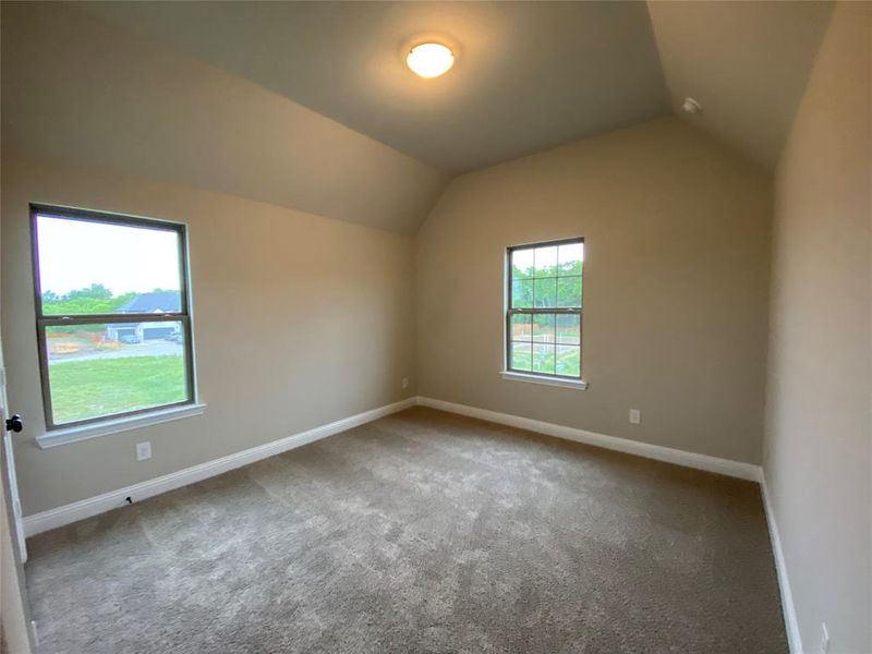 Bed 3 has vaulted ceiling and it's own bathroom. Is perfect for guests or adults living at home