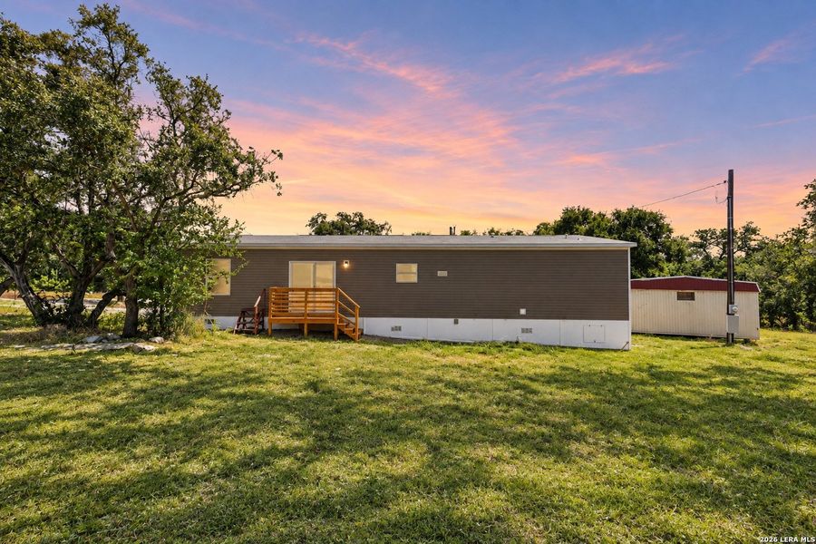 Exterior details and patio area of a home in , Hondo (Image 27).