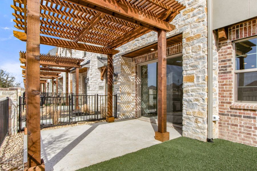 Exterior details and patio area of a home in The Tribute, The Colony (Image 4). Exterior details and patio area of a home in The Tribute, The Colony (Image 4).