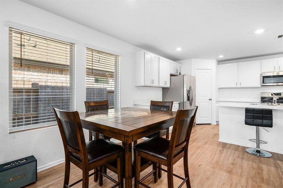 Great Breakfast area with plenty of space and open to the kitchen and family room.