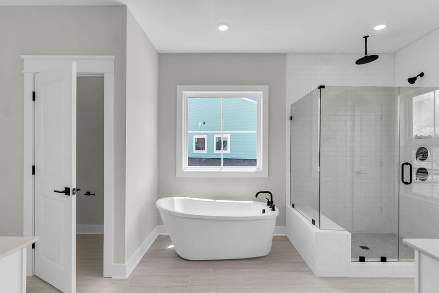 Furnished interior view inside a new home in Tidewater at Lakes of Cane Bay, Summerville (Image 35).