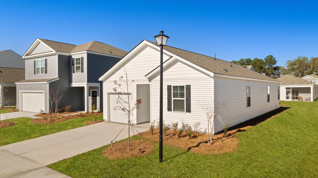 Front exterior of a new home in , Summerville, SC, highlighting curb appeal (Image 2). Front exterior of a new home in , Summerville, SC, highlighting curb appeal (Image 2).