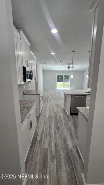 Furnished interior view inside a new home in , Jacksonville (Image 11).