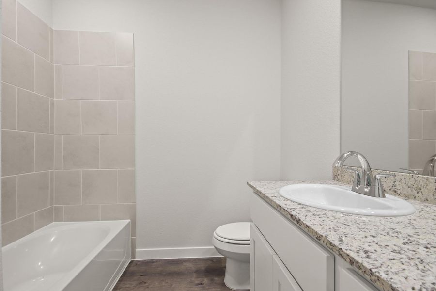 Furnished interior view inside a new home in Crockett Meadows, Cut and Shoot (Image 7).