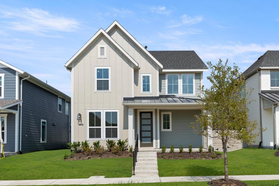 Front exterior of a new home in Carriage Collection at Painted Tree, McKinney, TX, highlighting curb appeal (Image 1). Front exterior of a new home in Carriage Collection at Painted Tree, McKinney, TX, highlighting curb appeal (Image 1).