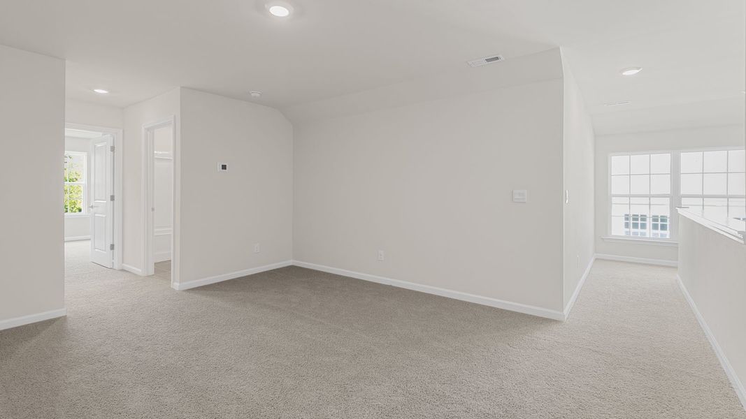 Spacious, unfurnished interior of a new home in The Villas at Kinsley, Jamestown (Image 24).