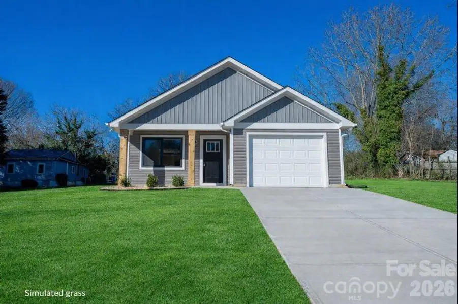 Front exterior of a new home in , Statesville, NC, highlighting curb appeal (Image 1). Front exterior of a new home in , Statesville, NC, highlighting curb appeal (Image 1).