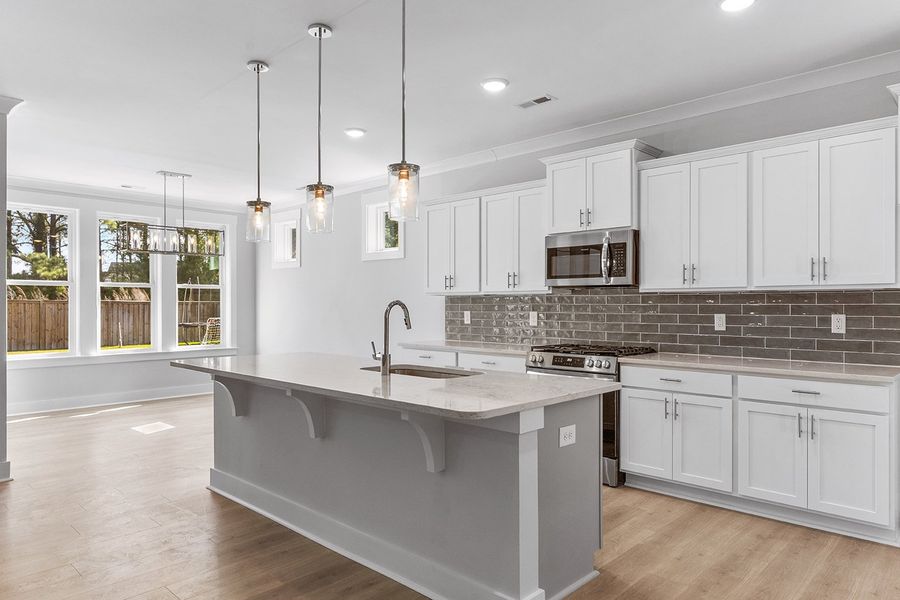 Representative furnished interior of a home built from the The Sutton by RobuckHomes in Windwater, Hampstead (Image 6). Representative furnished interior of a home built from the The Sutton by RobuckHomes in Windwater, Hampstead (Image 6).