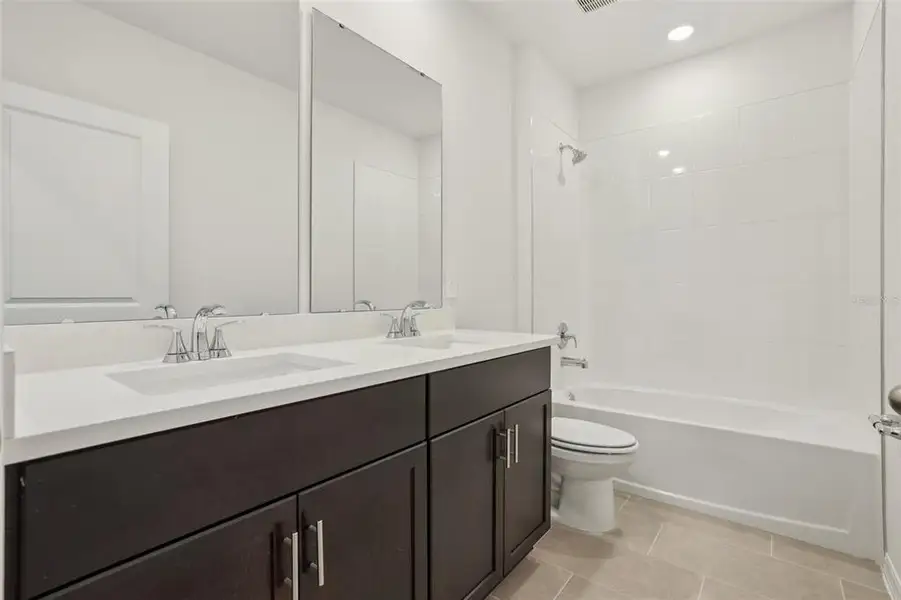 Furnished interior view inside a new home in Wynnstone - Signature Series, Davenport (Image 7).