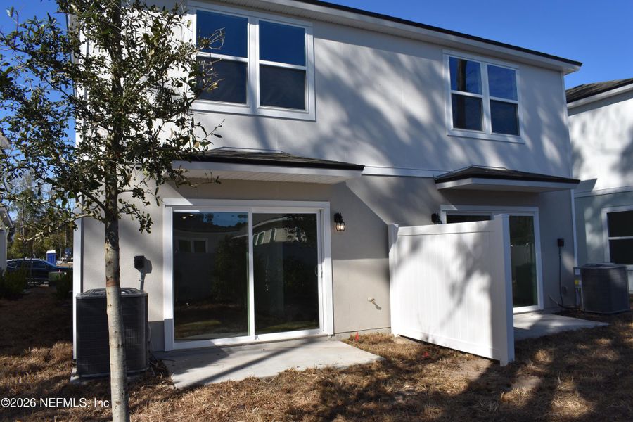 Exterior details and patio area of a home in Irongate Villas, Jacksonville (Image 3).