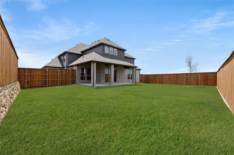 Front exterior of a new home in Cambridge Estates, Prosper, TX, highlighting curb appeal (Image 2).