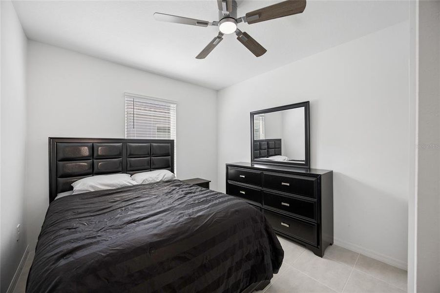 Furnished interior view inside a new home in Westview Community Group Page, Kissimmee (Image 11).