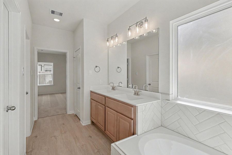 Furnished interior view inside a new home in Clear View Estates, Willis (Image 9).