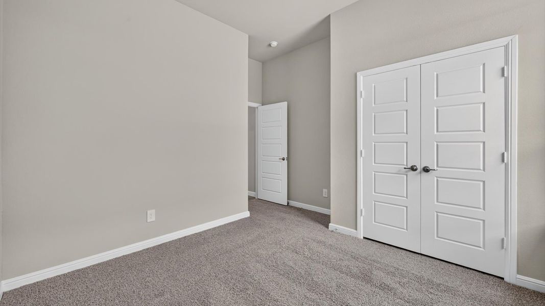 Representative unfurnished interior of a home built from the Bartlett by D.R. Horton in Lakeview Pointe, Midlothian (Image 22).