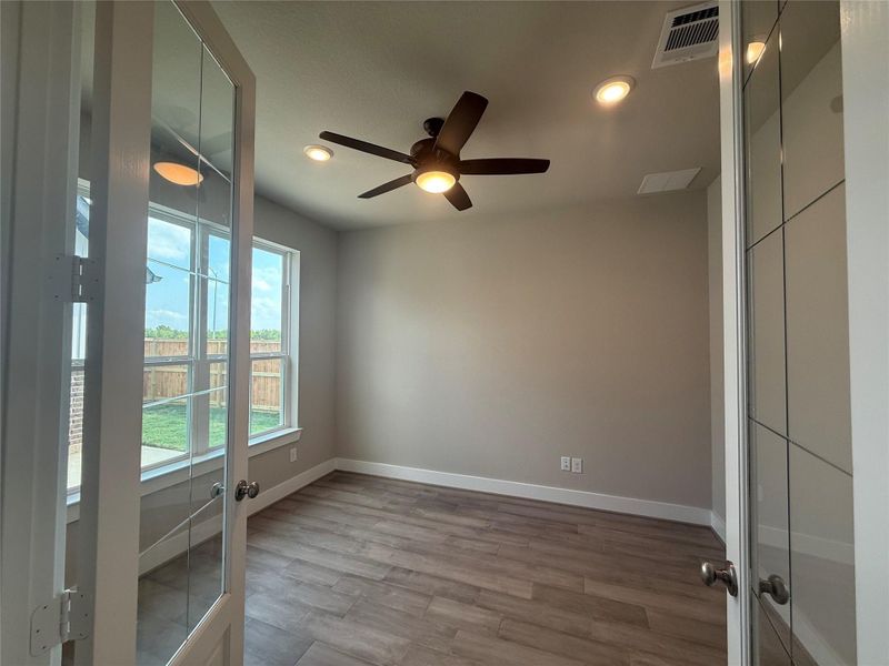 Office from home? This home office is spacious and has tons of natural light flowing through the space.