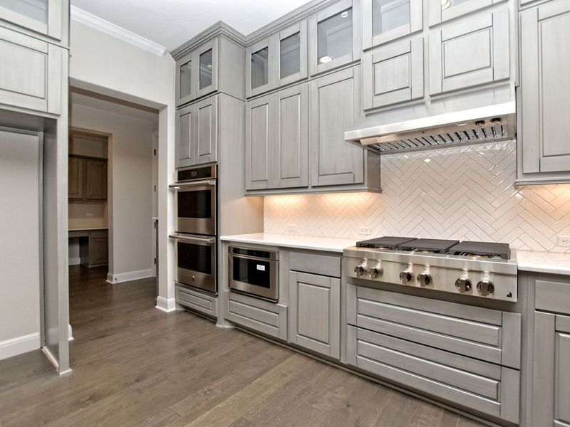 Representative furnished interior of a home built from the Madera II by Giddens Homes in Scofield Farms Estates, Georgetown (Image 191).