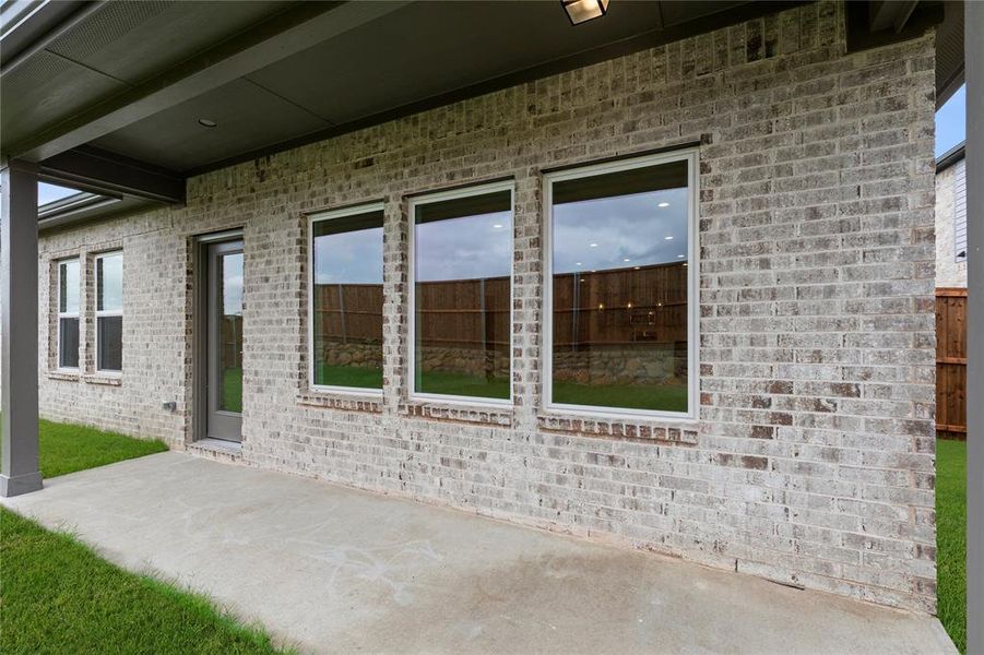 Exterior details and patio area of a home in Creekside, Royse City (Image 3).
