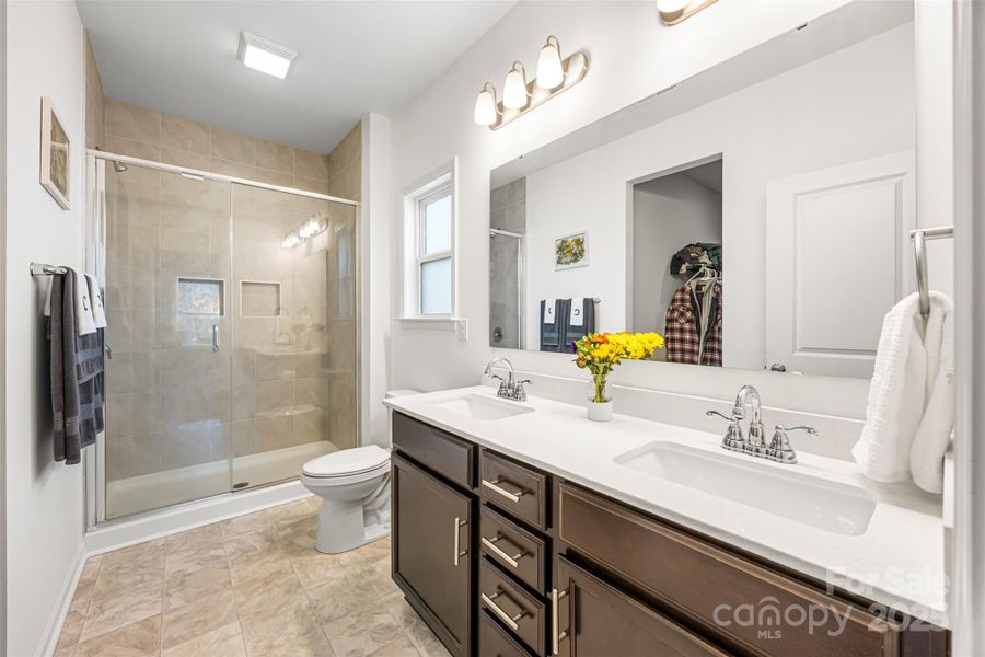 Primary bathroom that leads to walk in closet