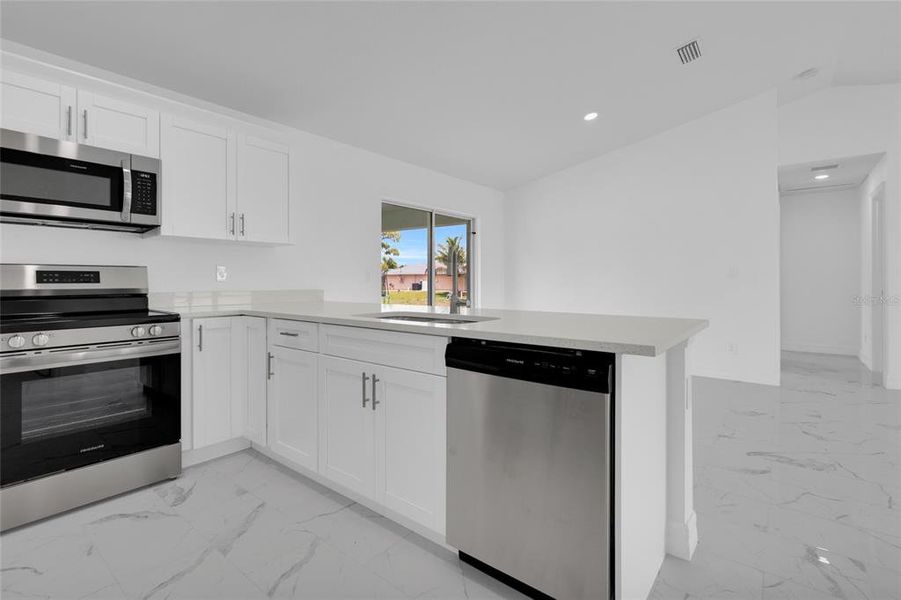 Furnished interior view inside a new home in , Cape Coral (Image 8).