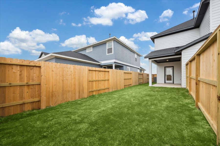 Exterior details and patio area of a home in Elyson, Katy (Image 3).