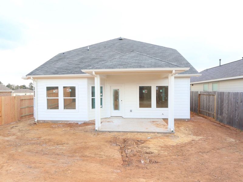 Exterior details and patio area of a home in Magnolia Ridge, Magnolia (Image 4).