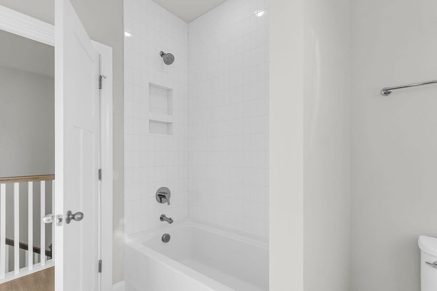 Furnished interior view inside a new home in Tidewater at Lakes of Cane Bay, Summerville (Image 11).