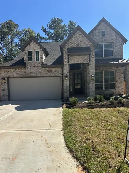 Exterior details and patio area of a home in The Woodlands Hills, Willis (Image 2). Exterior details and patio area of a home in The Woodlands Hills, Willis (Image 2).