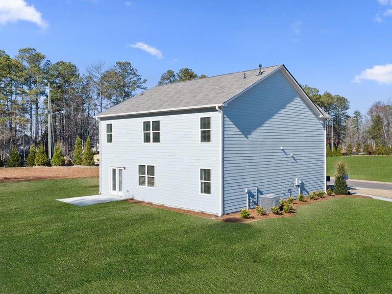 Front exterior of a new home in Thompson Ridge, Dallas, GA, highlighting curb appeal (Image 27).