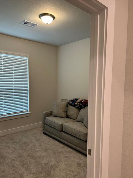 Flexible Bedroom or Office — Beautiful arched entryway leading to a versatile space that can be used as a secondary bedroom, guest room, or home office.