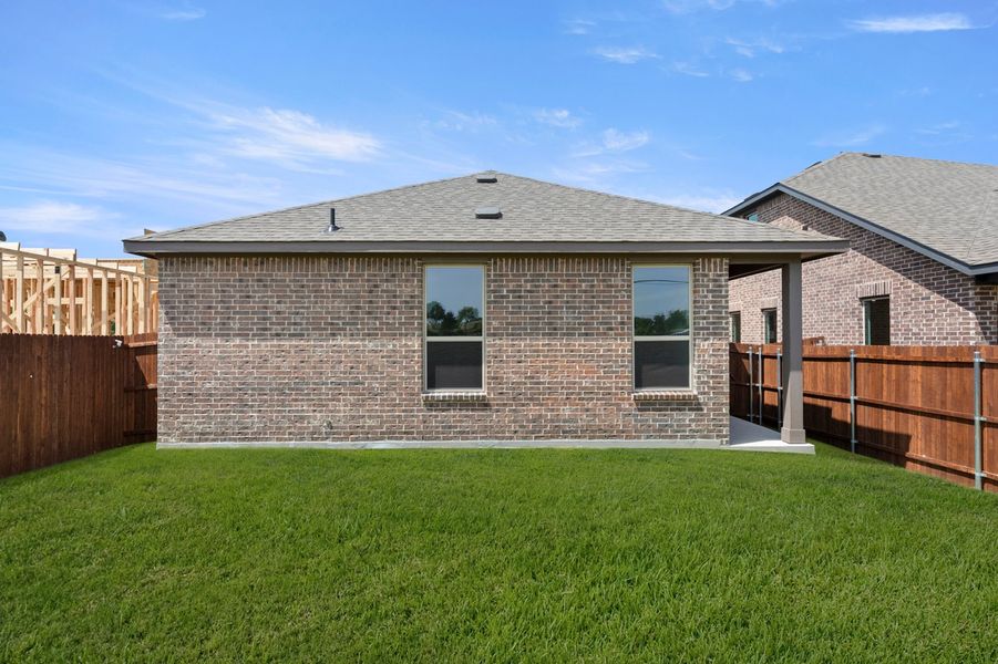 Front exterior of a new home in Churchill, Anna, TX, highlighting curb appeal (Image 26). Front exterior of a new home in Churchill, Anna, TX, highlighting curb appeal (Image 26).
