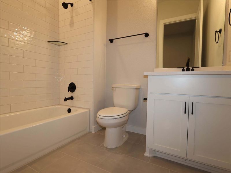 Furnished interior view inside a new home in Cedar Brook, Leander (Image 7). Furnished interior view inside a new home in Cedar Brook, Leander (Image 7).