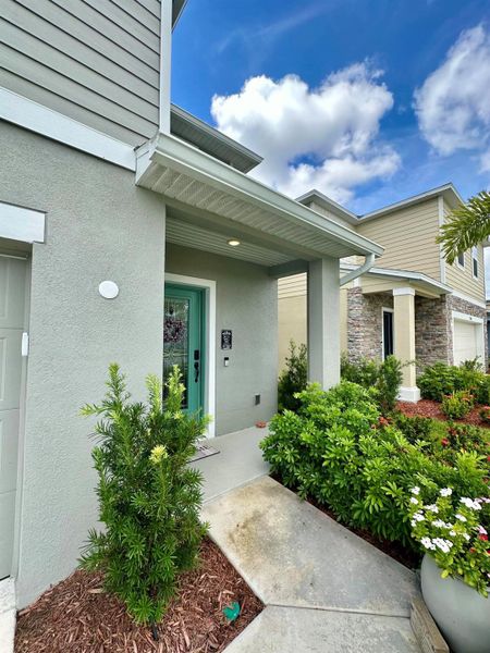 Front exterior of a new home in , Port St. Lucie, FL, highlighting curb appeal (Image 22).