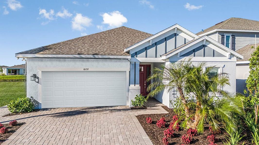 Representative exterior photo of a completed home built from the Grenada by Taylor Morrison in The Cove at West Port, Port Charlotte, FL (Image 17).