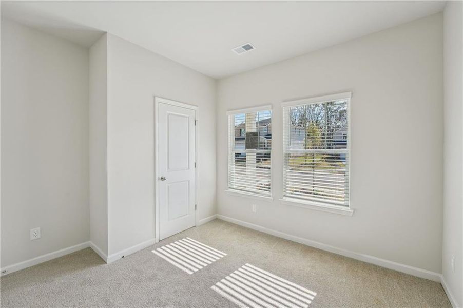 Spacious, unfurnished interior of a new home in Westmont Preserve, Powder Springs (Image 37).