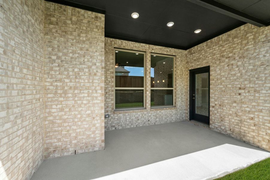 Exterior details and patio area of a home in Westside Preserve, Midlothian (Image 3).