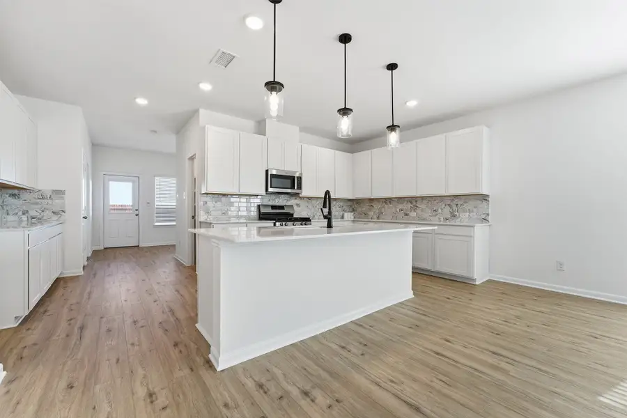 Furnished interior view inside a new home in Pebblebrook, Sherman (Image 6).