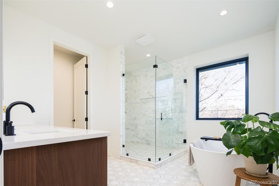 Light filled 5-piece primary bathroom