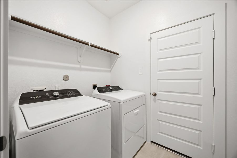 Laundry room by the garage and includes almost new washer and dryer! Laundry room by the garage and includes almost new washer and dryer!