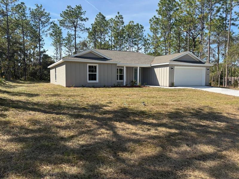 Exterior details and patio area of a home in , Citrus Springs (Image 24).